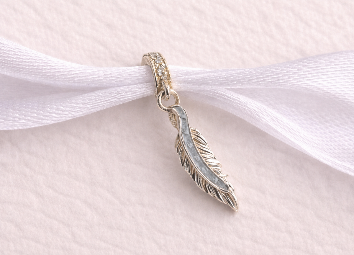Feather charm